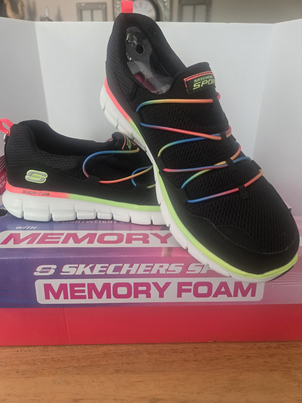Skechers Kids Black Slip-On Sneakers with Neon Rainbow Elastic Accents
